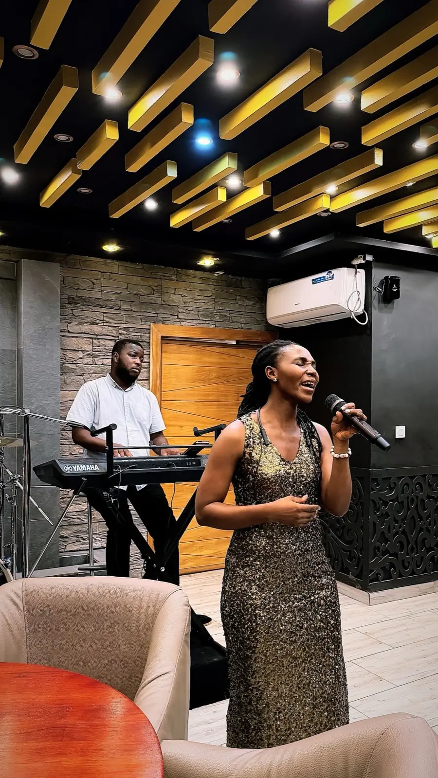 A singer performing in the lounge